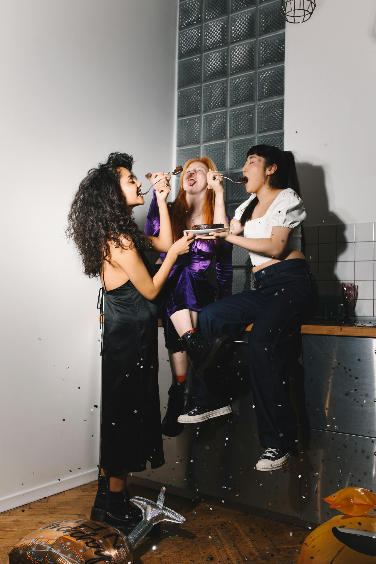 A group of women hosting an intimate dinner party